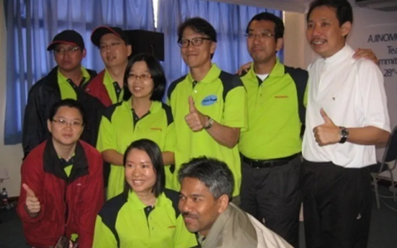 Ajinomoto staff seated together at a programme